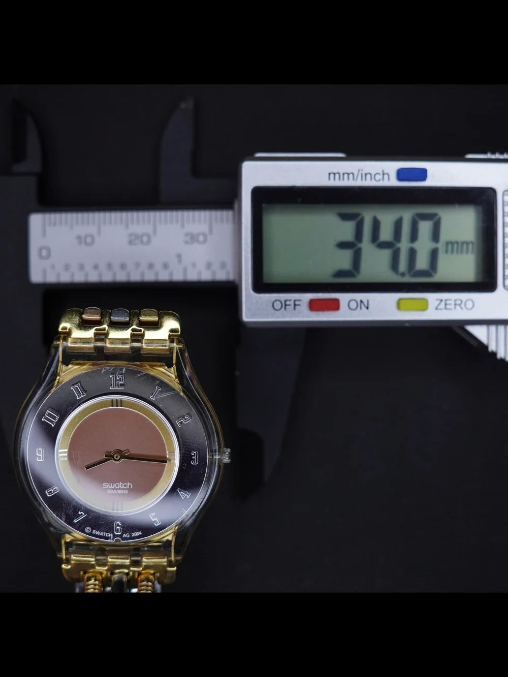 Vintage Swatch Swiss Quartz Transparent Gold Tone Black Dial Ladies Watch Runs